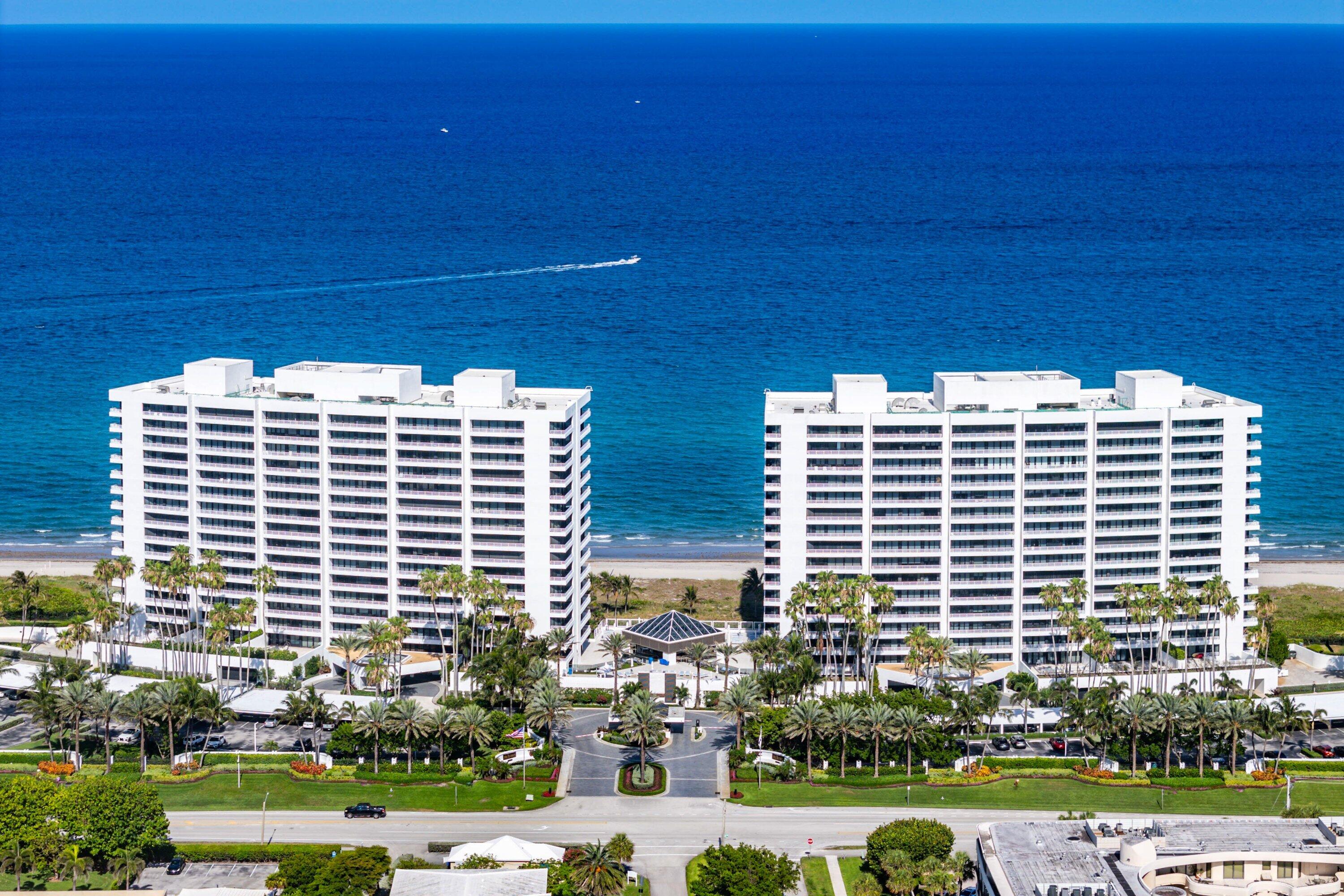 1500 South Ocean Boulevard, Unit 604 Boca Raton, FL 33432 - Photo 2 of 61 a front view of a building with a yard