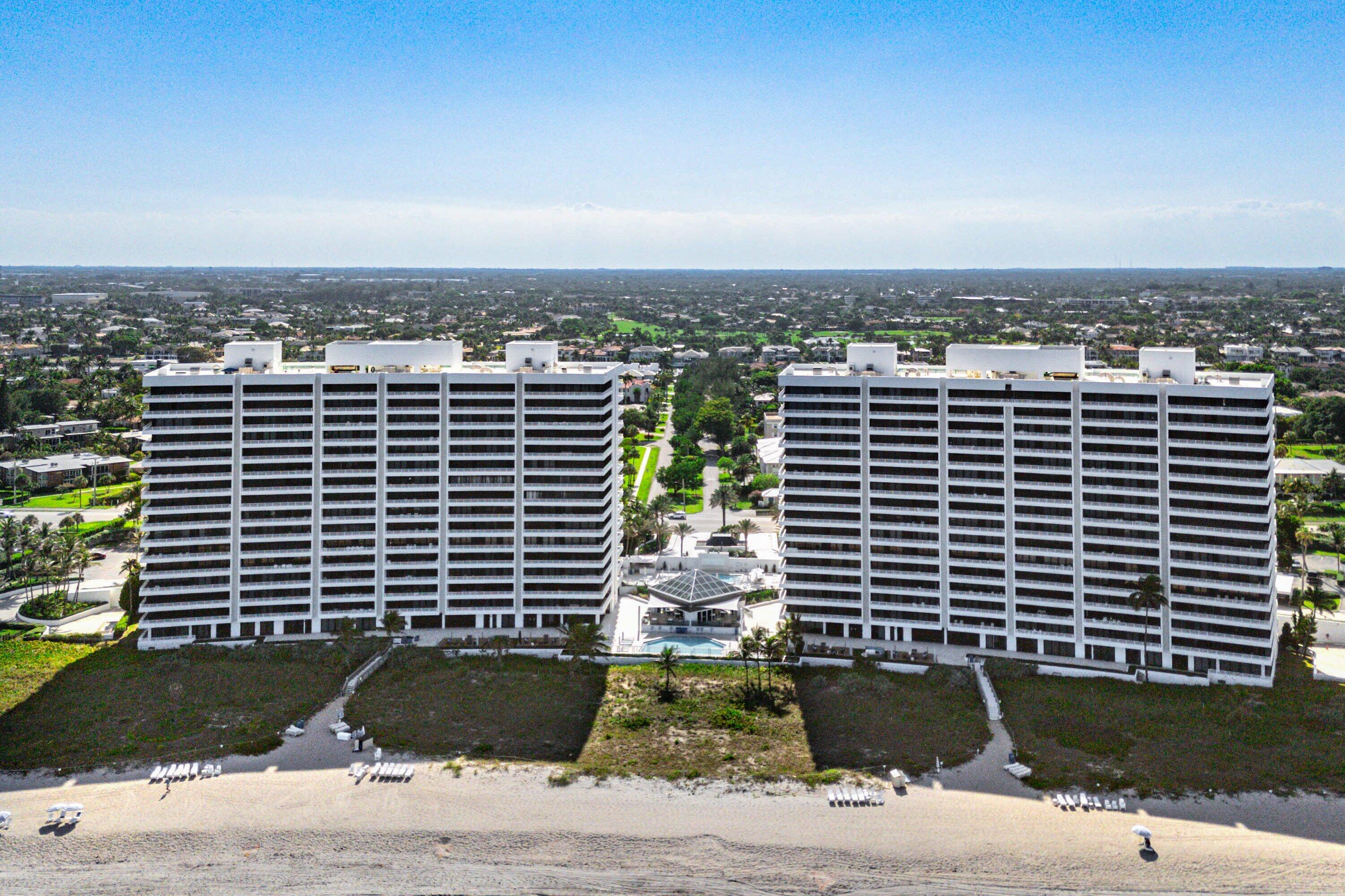 1500 South Ocean Boulevard, Unit 604 Boca Raton, FL 33432 - Photo 55 of 61 a front view of a building with a yard