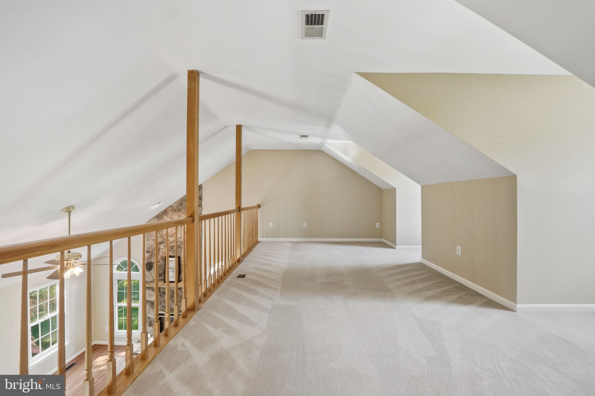 21507 Tithables Circle Broadlands, VA 20148 - Photo 24 of 64 a view of an empty room with stairs