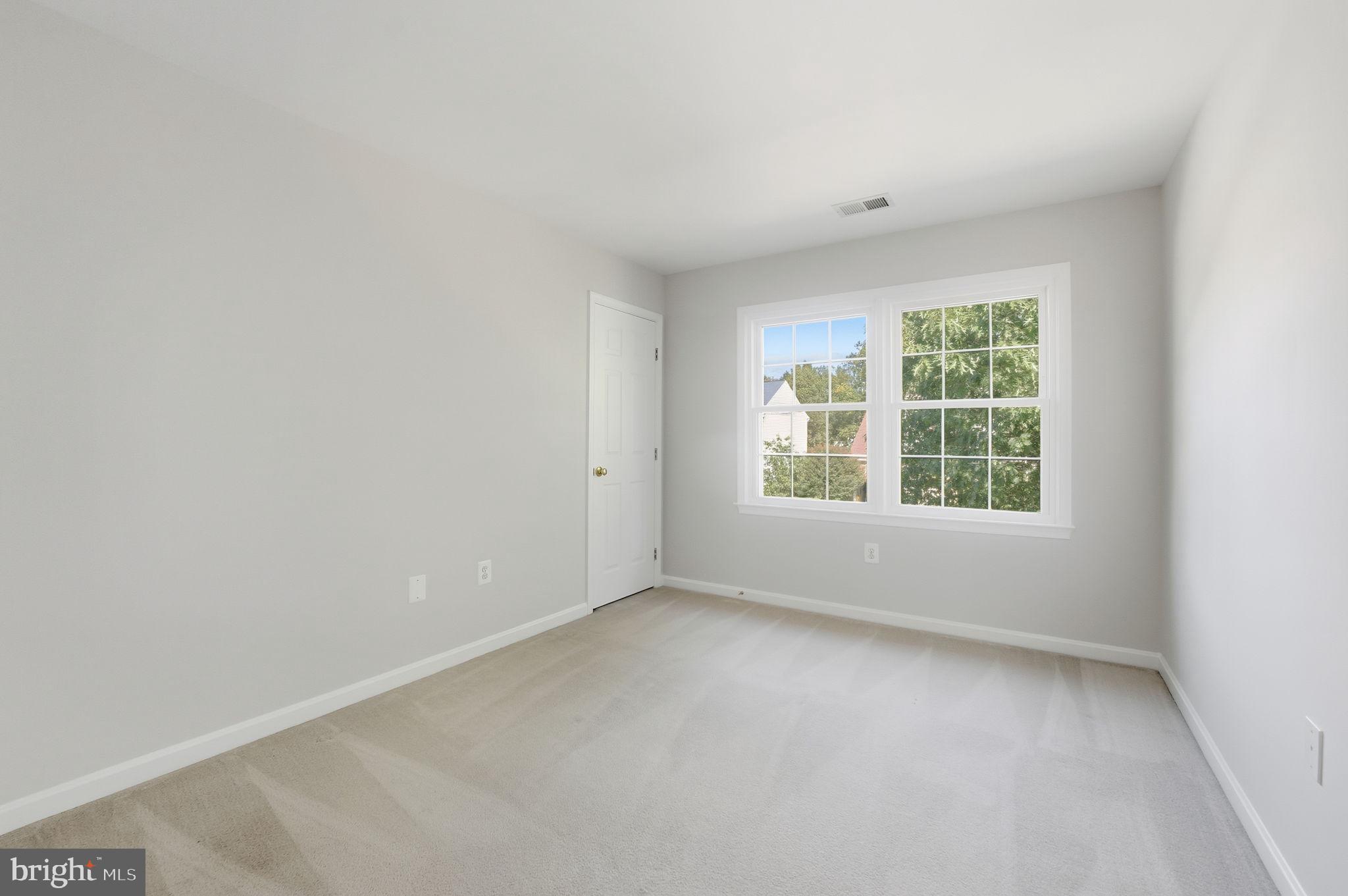21507 Tithables Circle Broadlands, VA 20148 - Photo 30 of 64 an empty room with windows