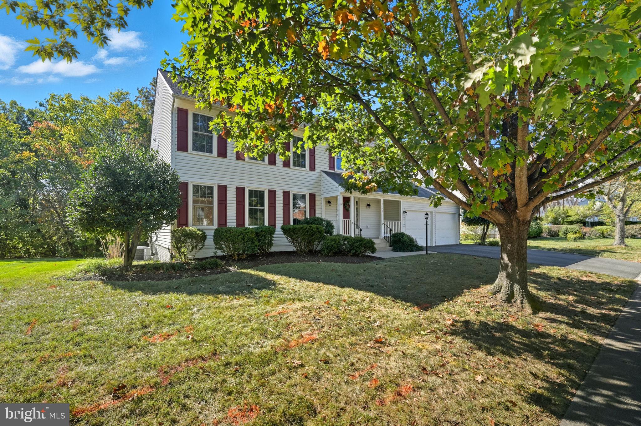 21507 Tithables Circle Broadlands, VA 20148 - Photo 3 of 64 a front view of a house with garden