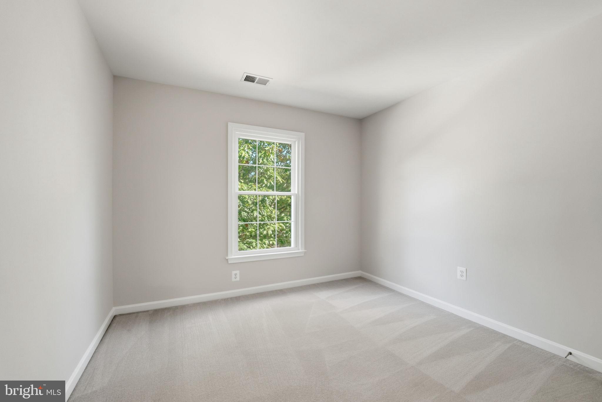 21507 Tithables Circle Broadlands, VA 20148 - Photo 32 of 64 an empty room with a window