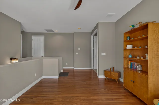 a view of livingroom with furniture and wooden floor