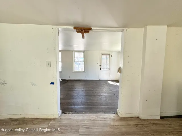 a view of bathroom with wooden floor