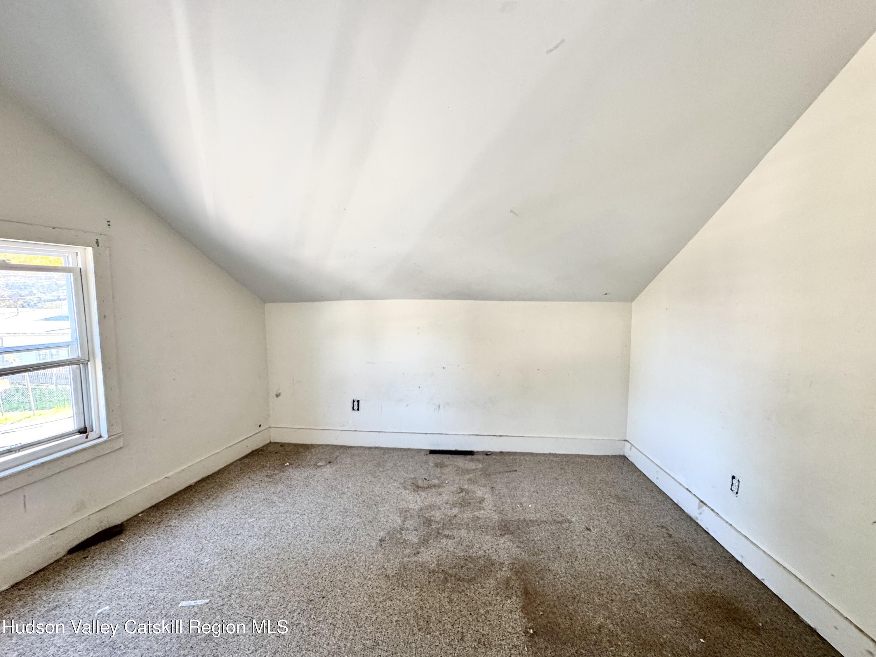384 Highway 296 Windham, NY 12439 - Photo 16 of 26 an empty room with a window