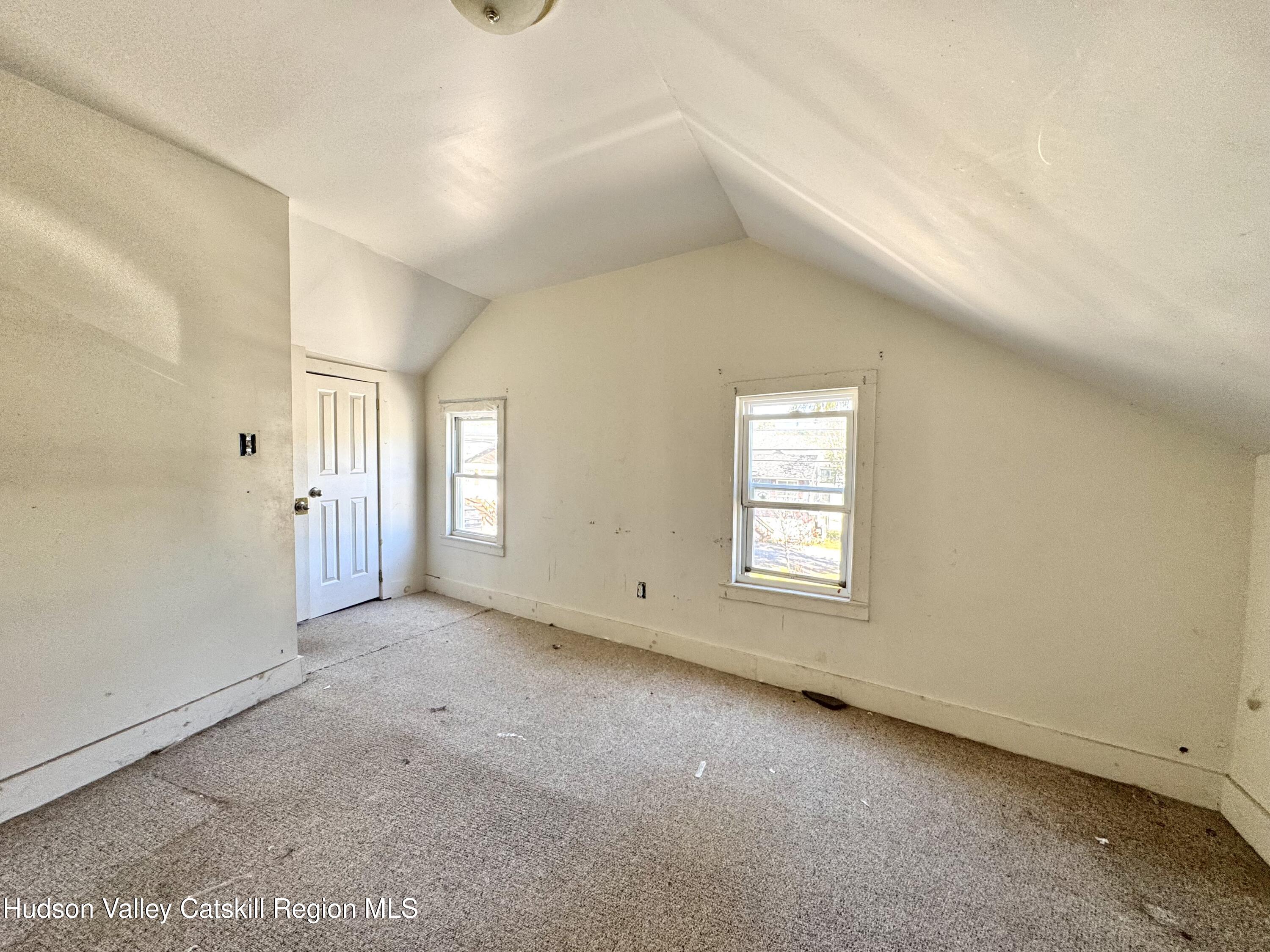 384 Highway 296 Windham, NY 12439 - Photo 17 of 26 an empty room with windows