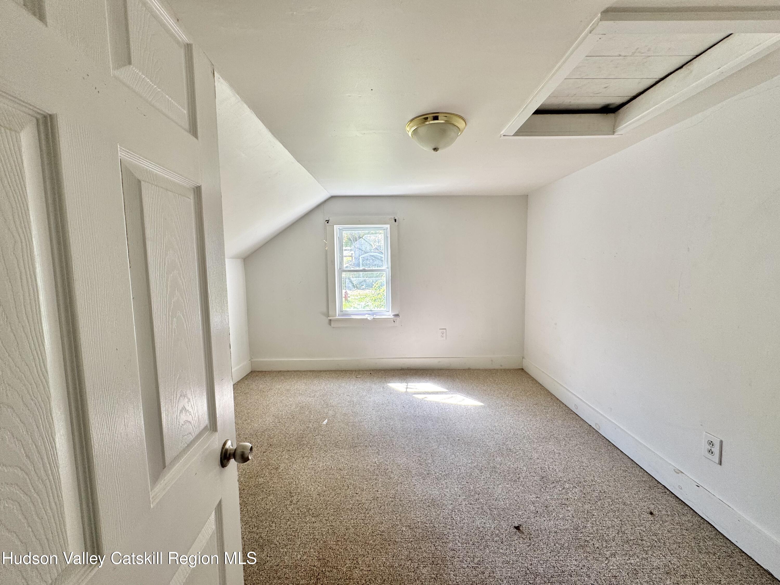 384 Highway 296 Windham, NY 12439 - Photo 19 of 26 an empty room with windows