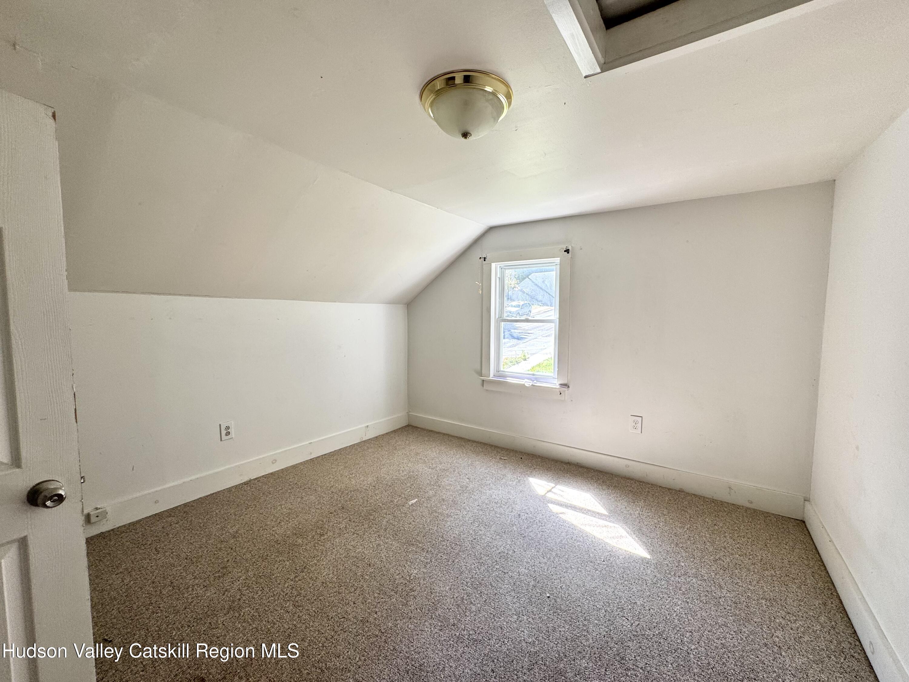 384 Highway 296 Windham, NY 12439 - Photo 20 of 26 a view of an empty room with a window
