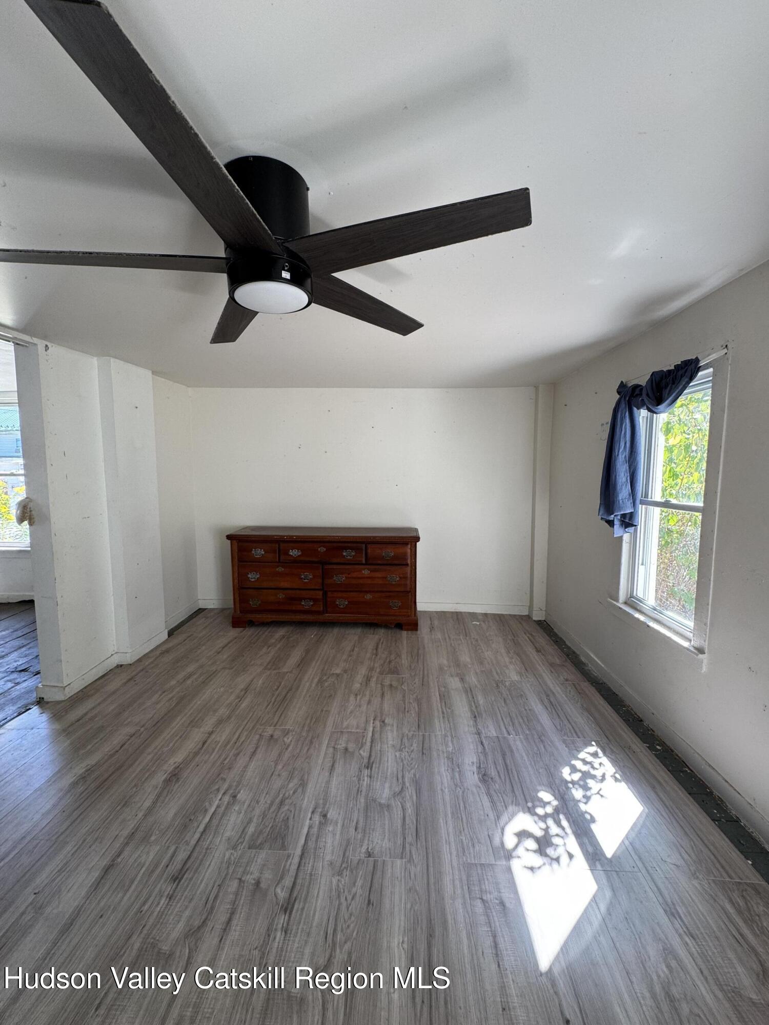 384 Highway 296 Windham, NY 12439 - Photo 25 of 26 a view of wooden floor in an empty room
