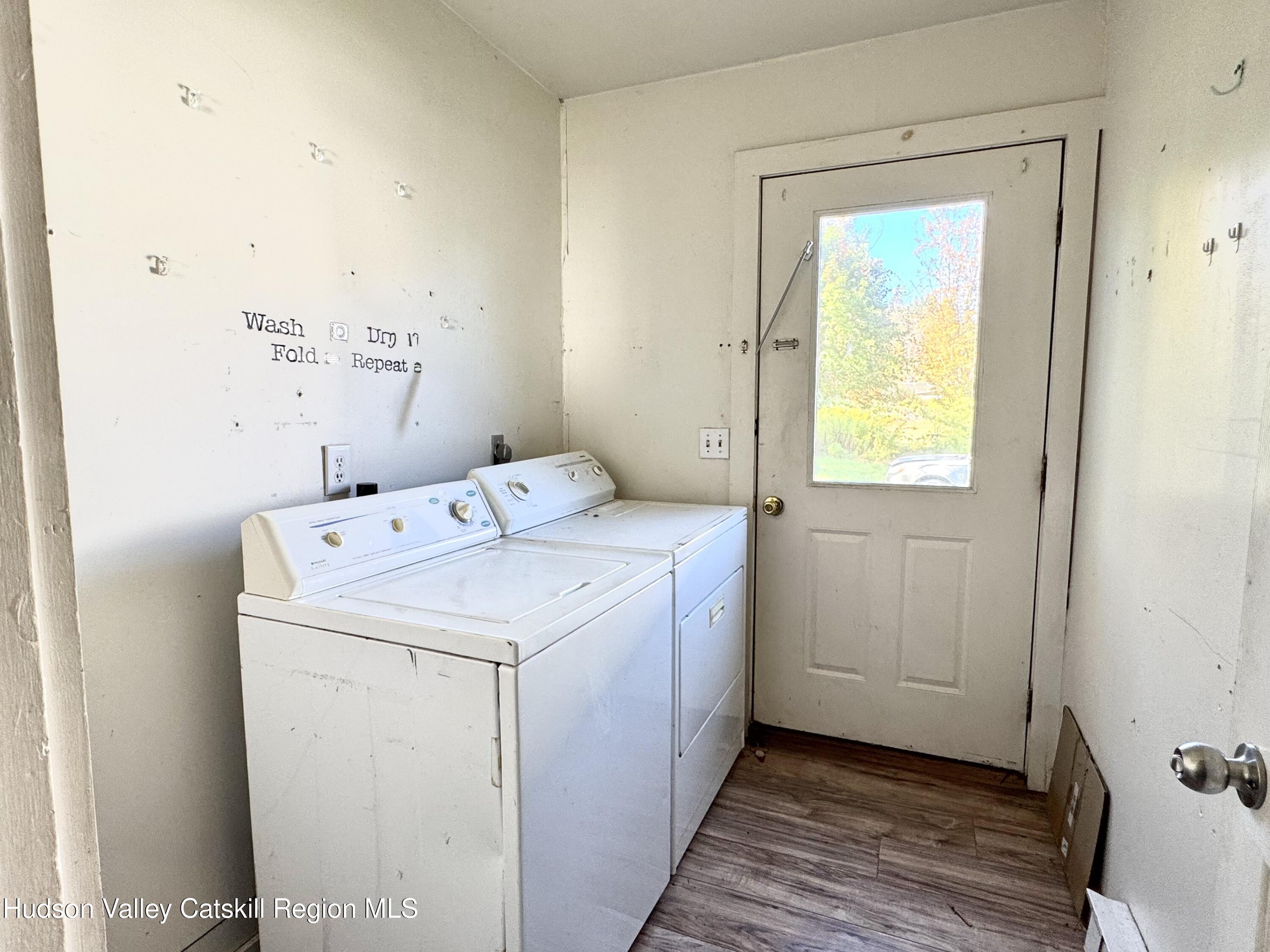 384 Highway 296 Windham, NY 12439 - Photo 7 of 26 a utility room with dryer and washer