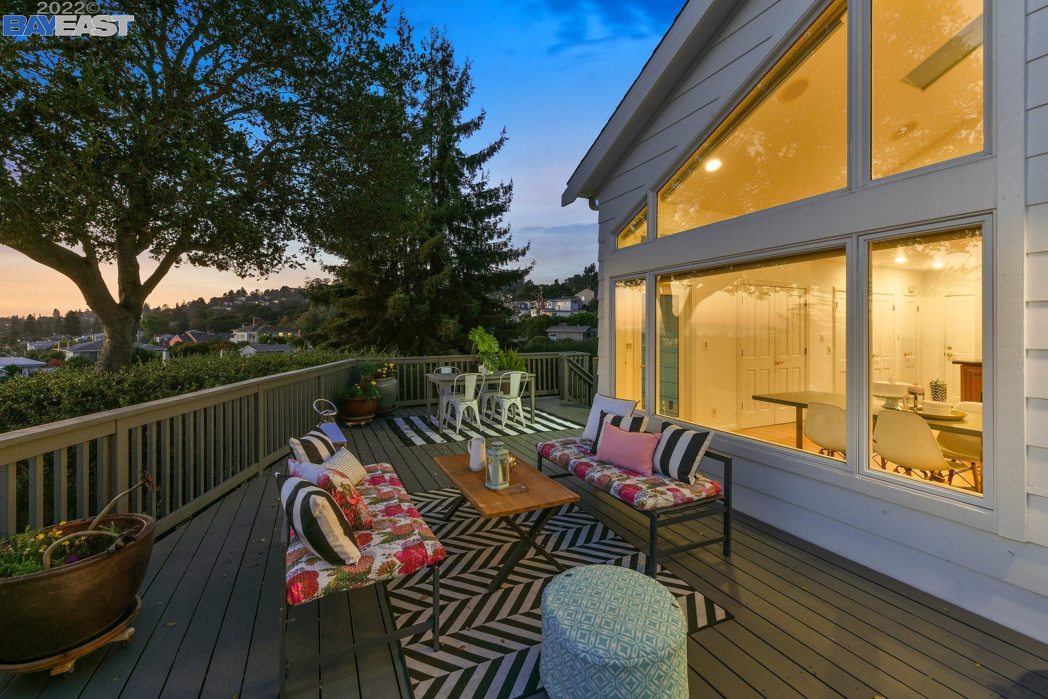 7 Barner Place Oakland, CA 94602 - Photo 1 of 1 a view of deck with furniture and trees in the front