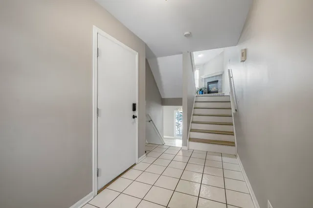 a view of an entryway with stairs