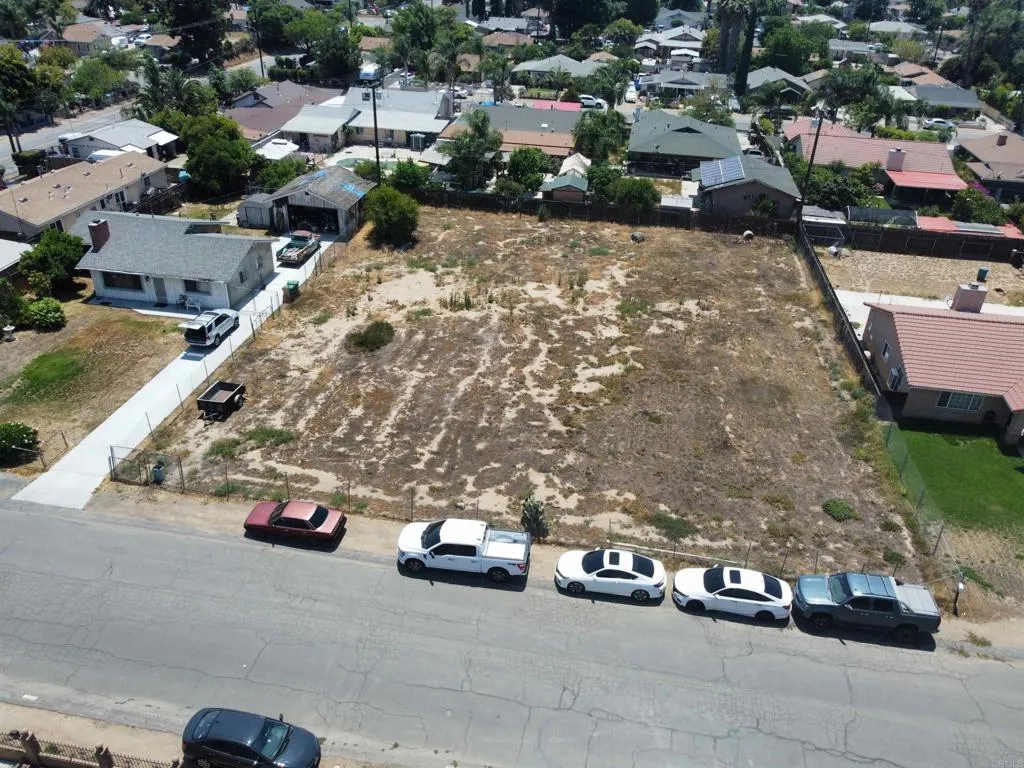 115 Byron Corona, CA 92879 - Photo 5 of 8 an aerial view of a house with a parking space