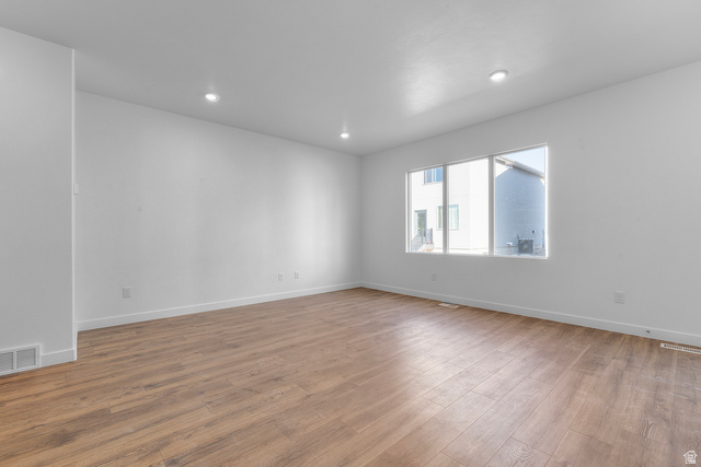 788 West 2840 South, Unit 2 Logan, UT 84321 - Photo 6 of 21 Open concept living space featuring wood-finish flooring and recessed lighting