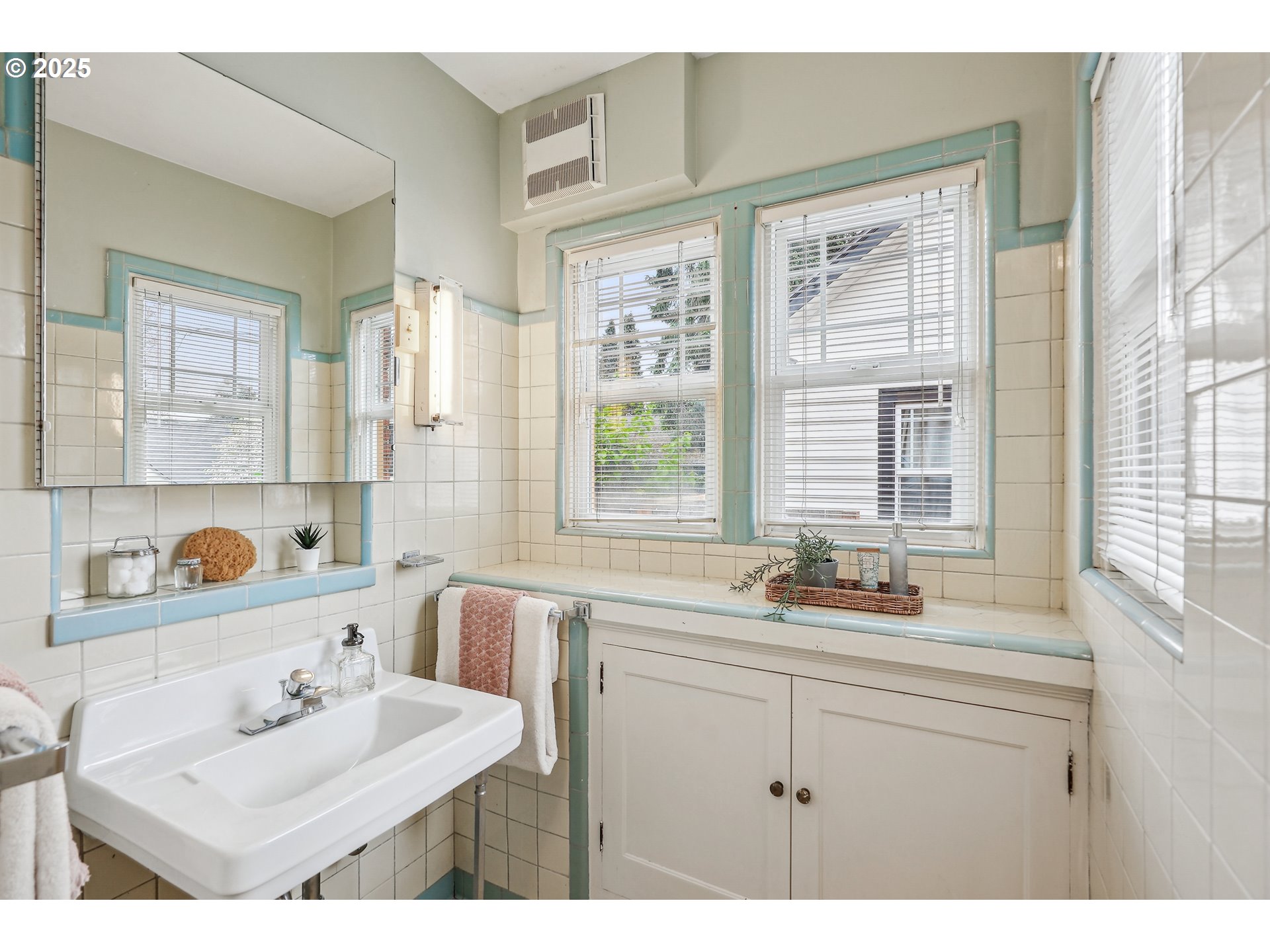 4324 Southeast 28th Avenue Portland, OR 97202 - Photo 21 of 42 a bathroom with a sink and a window