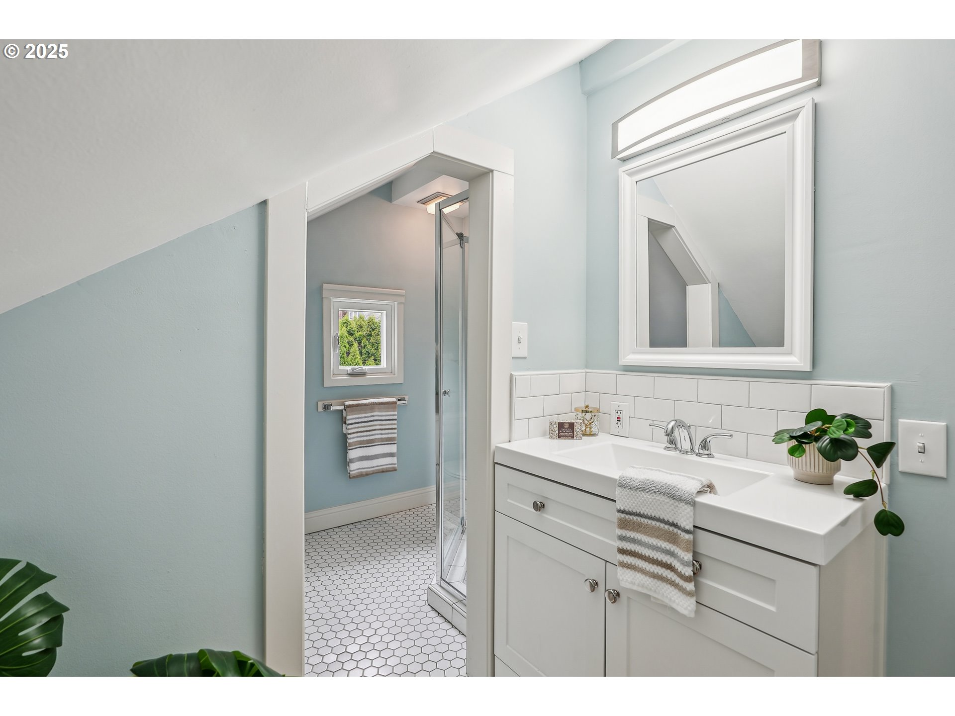 4324 Southeast 28th Avenue Portland, OR 97202 - Photo 22 of 42 a bathroom with a sink a mirror and a toilet