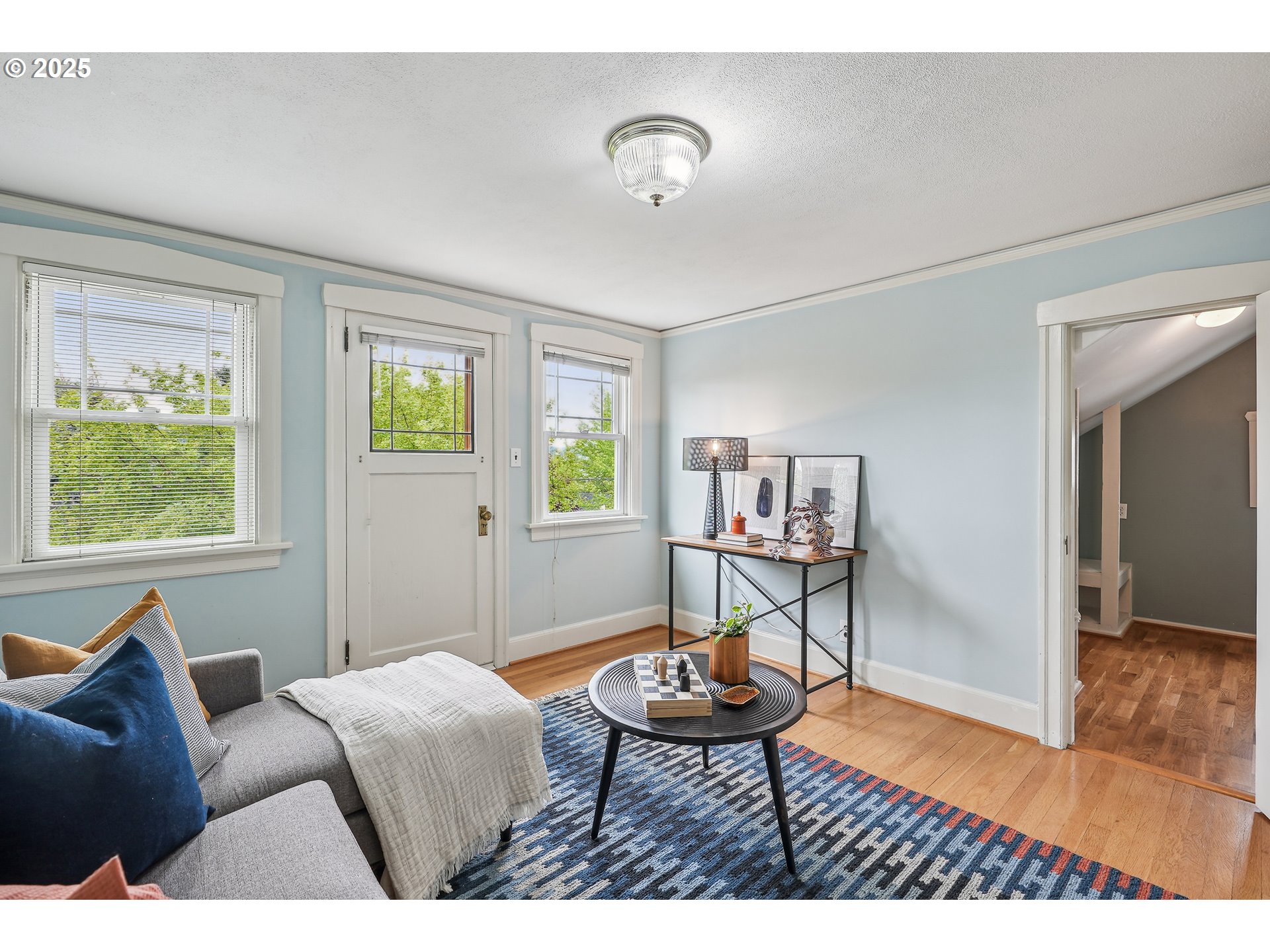 4324 Southeast 28th Avenue Portland, OR 97202 - Photo 32 of 42 a living room with furniture and a window