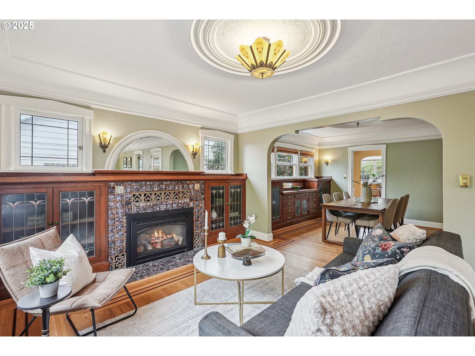 4324 Southeast 28th Avenue Portland, OR 97202 - Photo 4 of 42 a living room with furniture a fireplace and a table