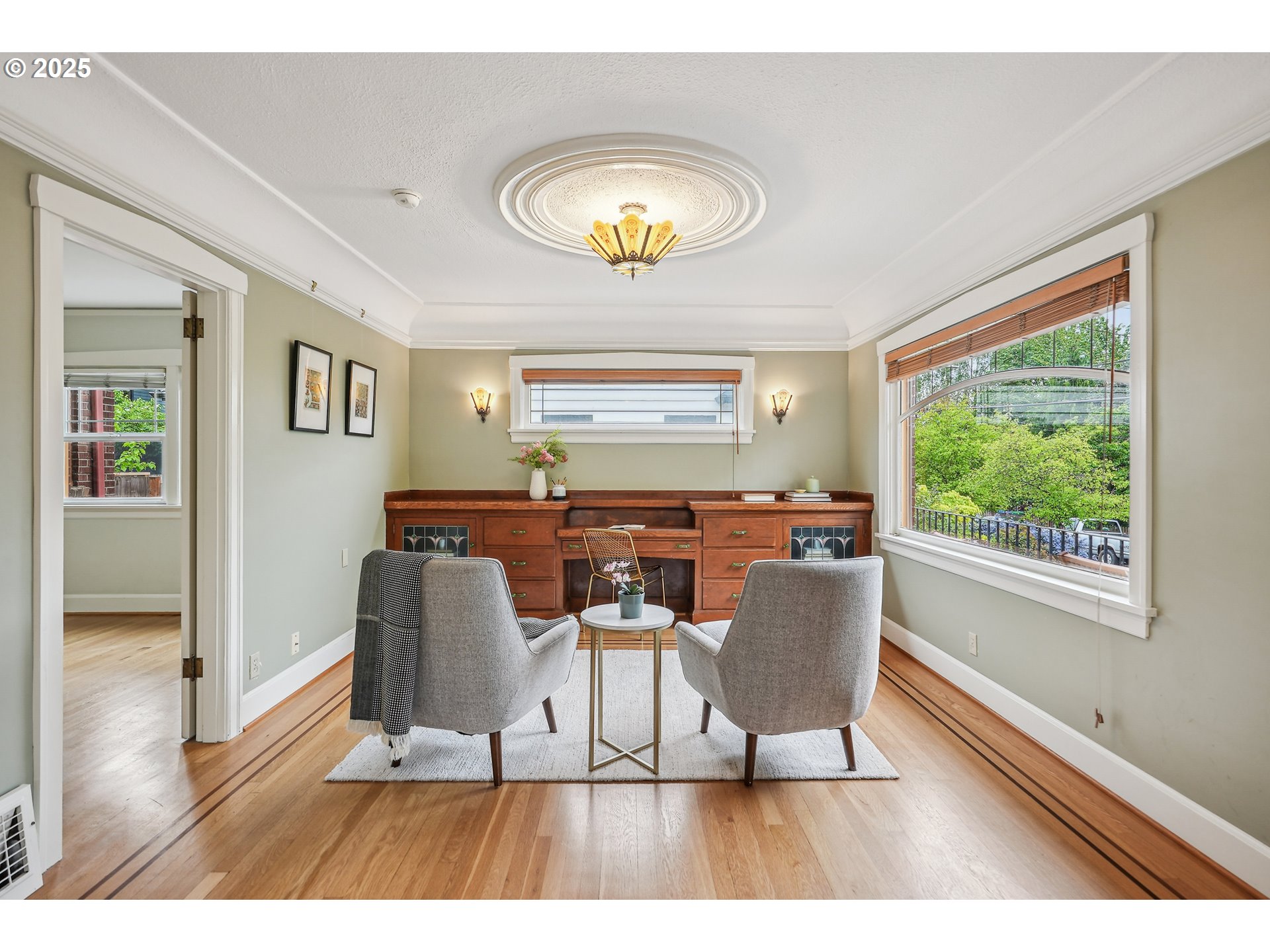 4324 Southeast 28th Avenue Portland, OR 97202 - Photo 7 of 42 a view of a dining room with furniture and a potted plant