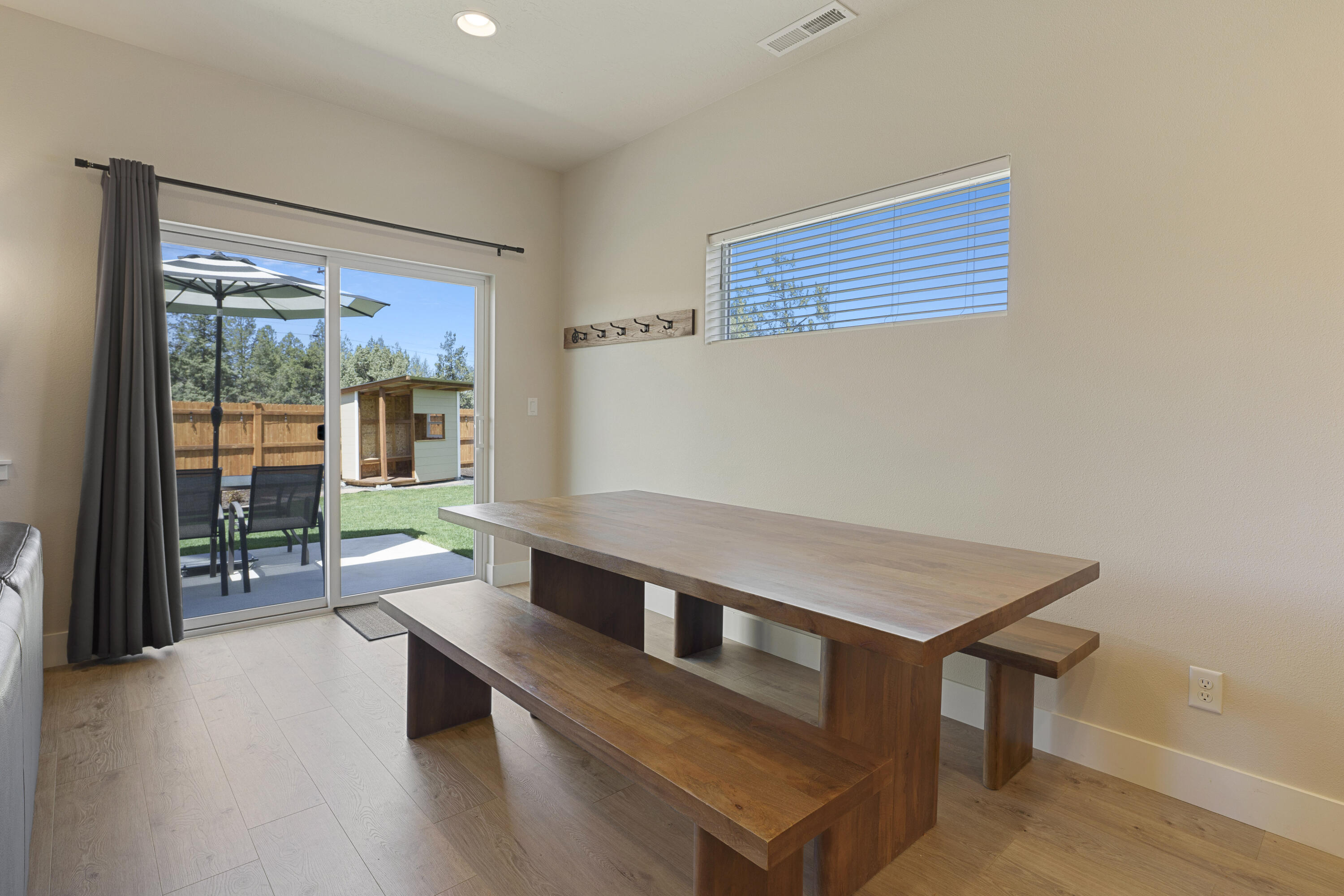 4999 Southwest Yew Place Redmond, OR 97756 - Photo 20 of 50 a room with furniture and glass door