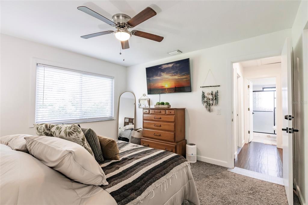 156 Danforth Drive Punta Gorda, FL 33980 - Photo 20 of 58 a bedroom with furniture and a flat screen tv