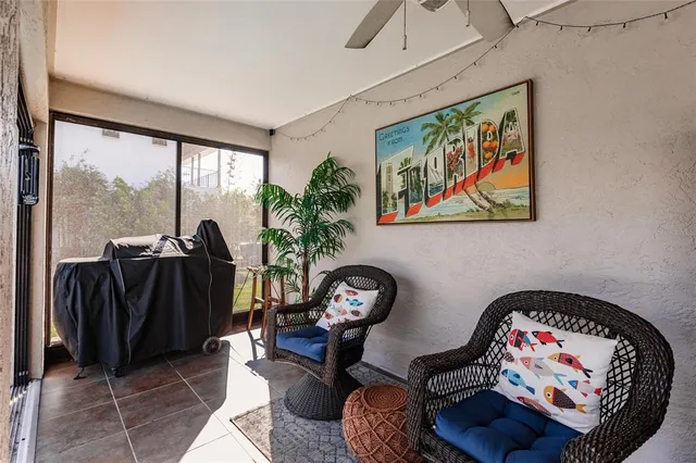 a view of a chairs and table in the patio