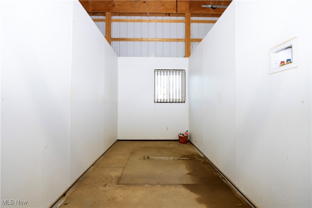 8995 Ridge Road Wooster, OH 44691 - Photo 11 of 50 Empty room with concrete flooring