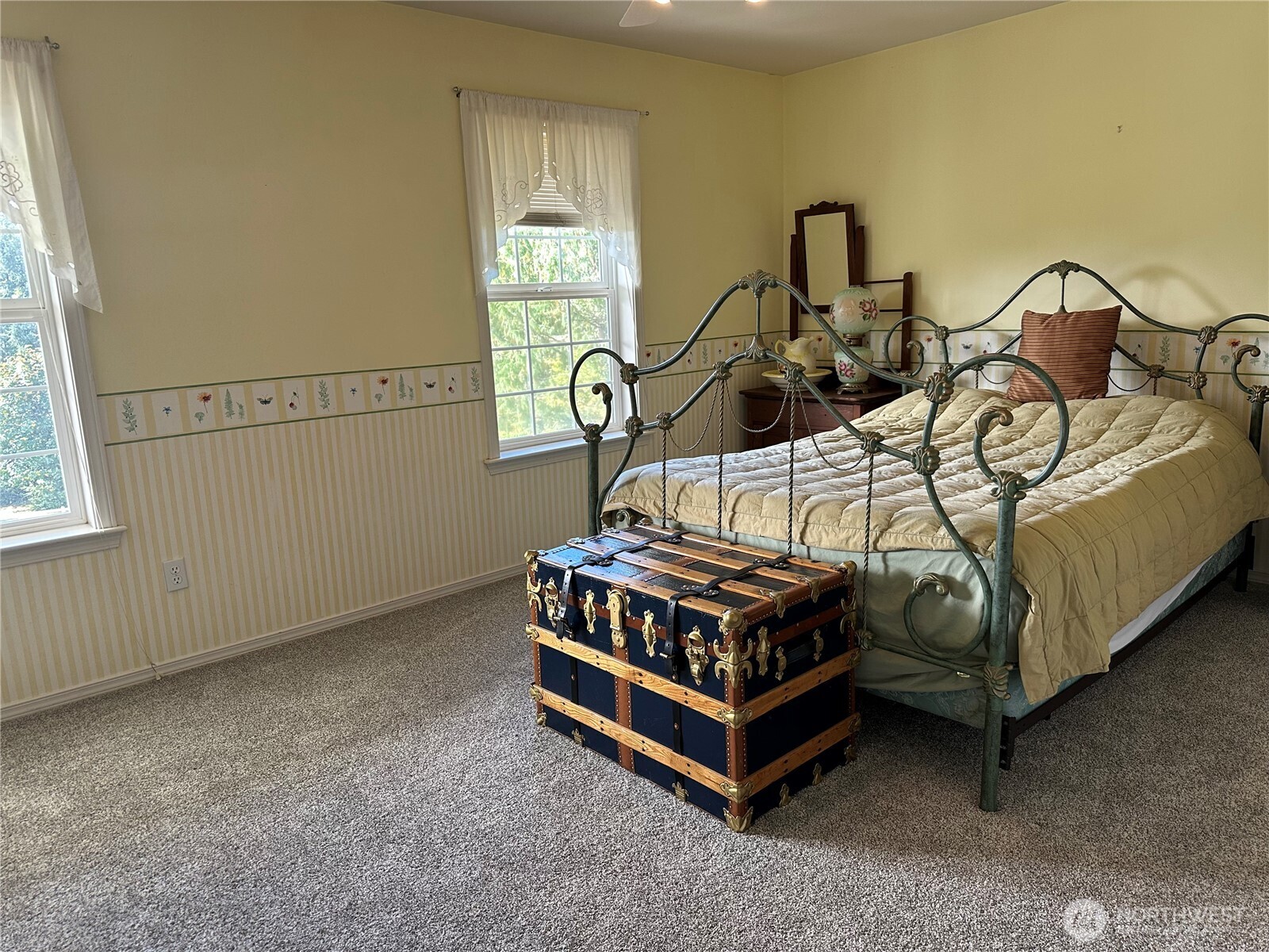 12832 Hunter Road Southwest Rochester, WA 98579 - Photo 12 of 40 a bedroom with bed and a window