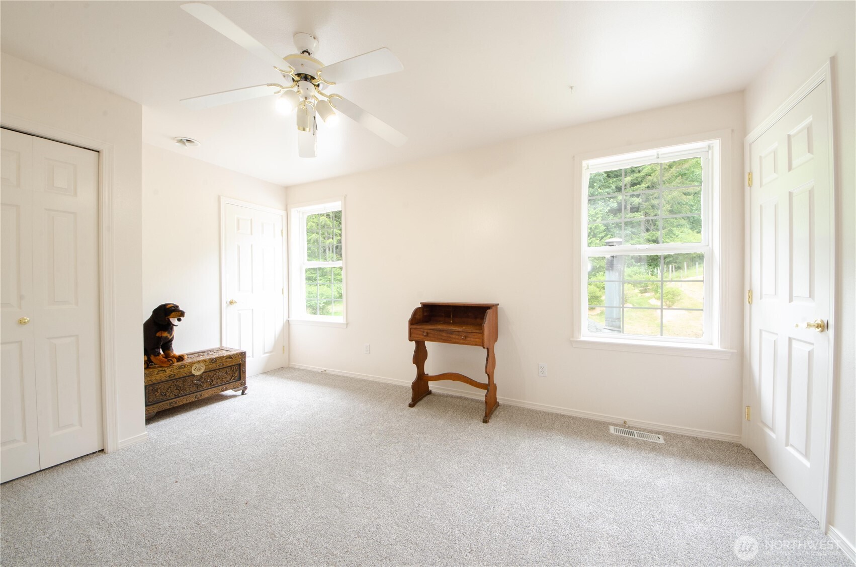 12832 Hunter Road Southwest Rochester, WA 98579 - Photo 14 of 40 a living room with furniture and a window