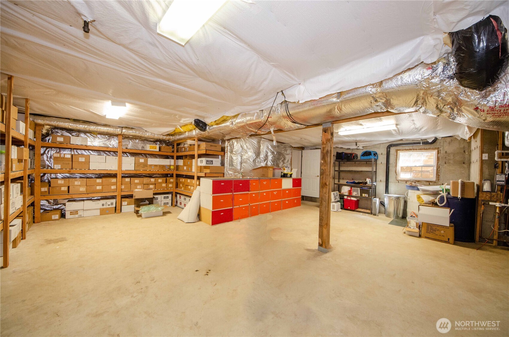 12832 Hunter Road Southwest Rochester, WA 98579 - Photo 17 of 40 a view of a garage with furniture
