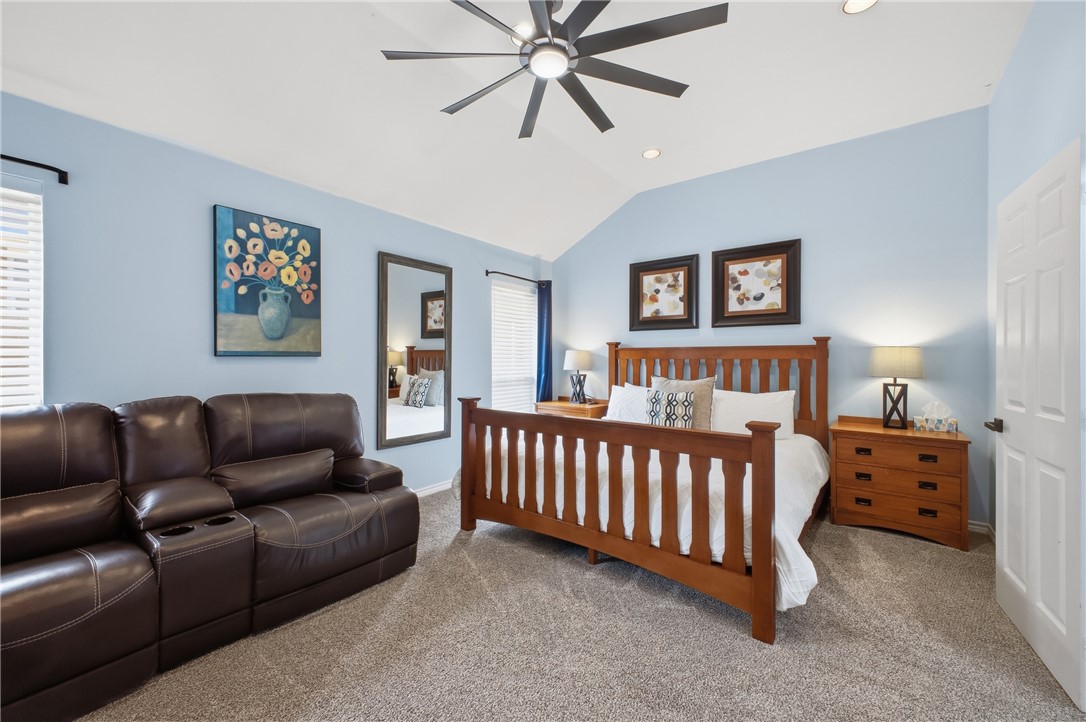 1702 Ibis Court Bryan, TX 77807 - Photo 13 of 18 a bedroom with bed couch and window