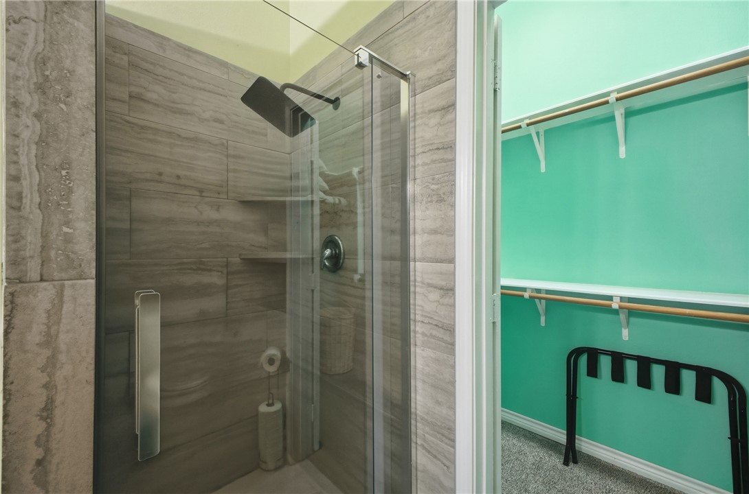 1702 Ibis Court Bryan, TX 77807 - Photo 16 of 18 a bathroom with a shower