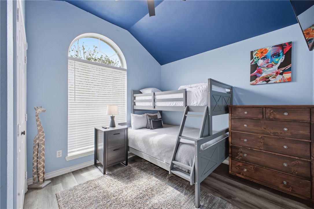 1702 Ibis Court Bryan, TX 77807 - Photo 9 of 18 a bedroom with a bed and a window