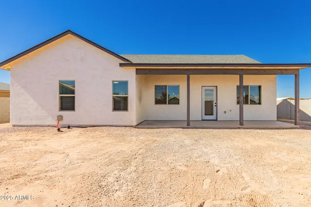 a view of backyard of house