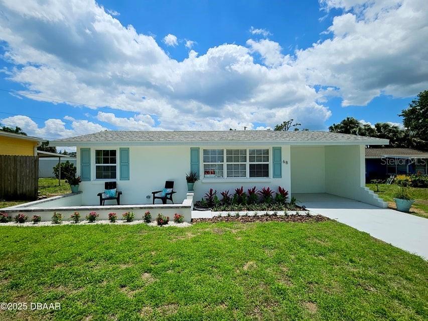 front view of house with a yard