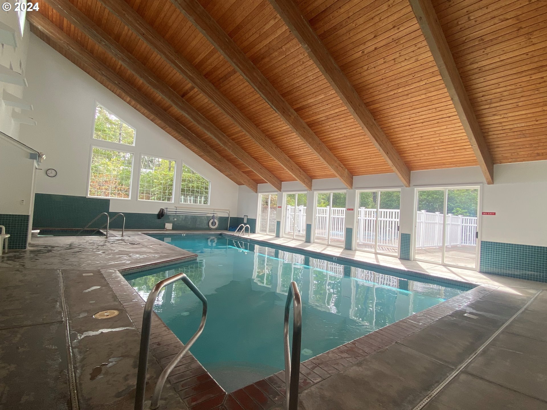 865 Western Way Florence, OR 97439 - Photo 21 of 26 a view of a swimming pool with outdoor seating