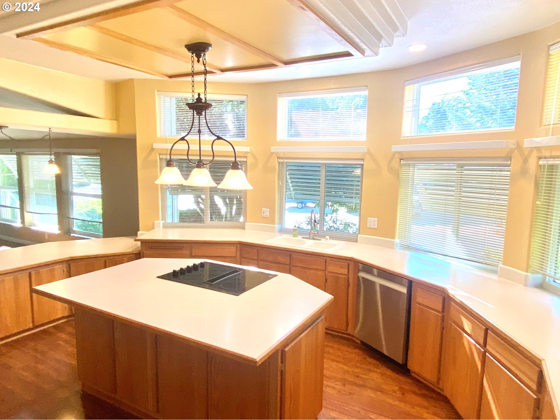 865 Western Way Florence, OR 97439 - Photo 3 of 26 a kitchen with a sink and large windows