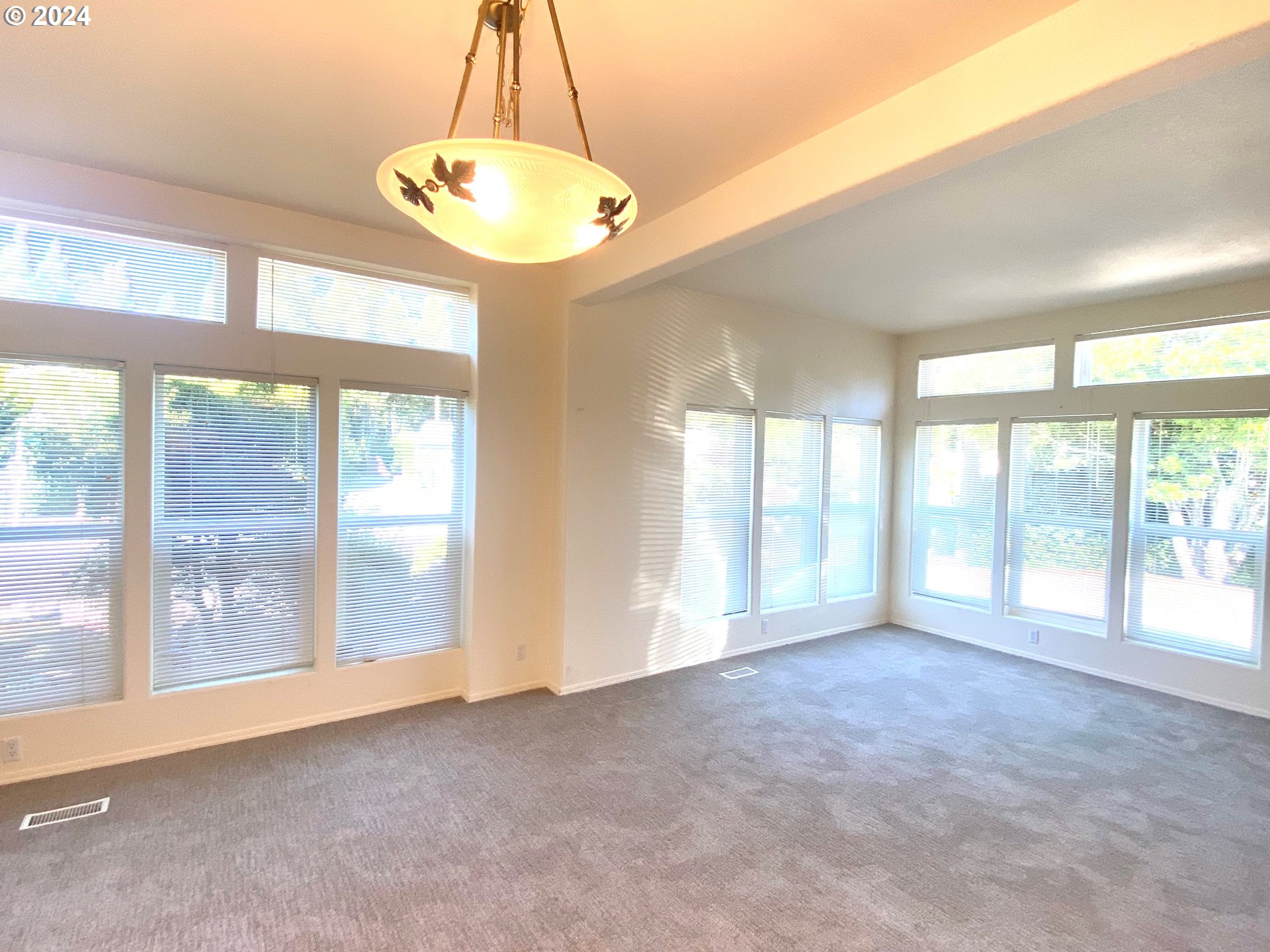 865 Western Way Florence, OR 97439 - Photo 7 of 26 a view of an empty room with a window
