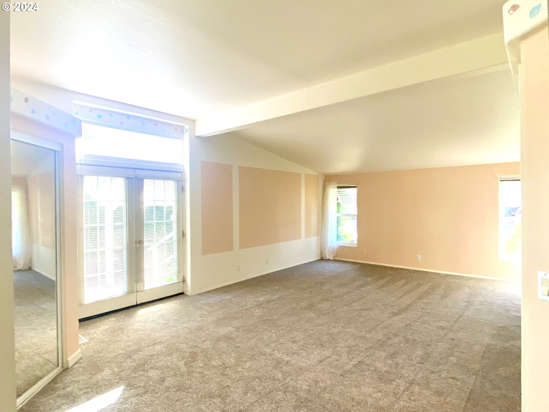 865 Western Way Florence, OR 97439 - Photo 9 of 26 a view of an empty room with a window