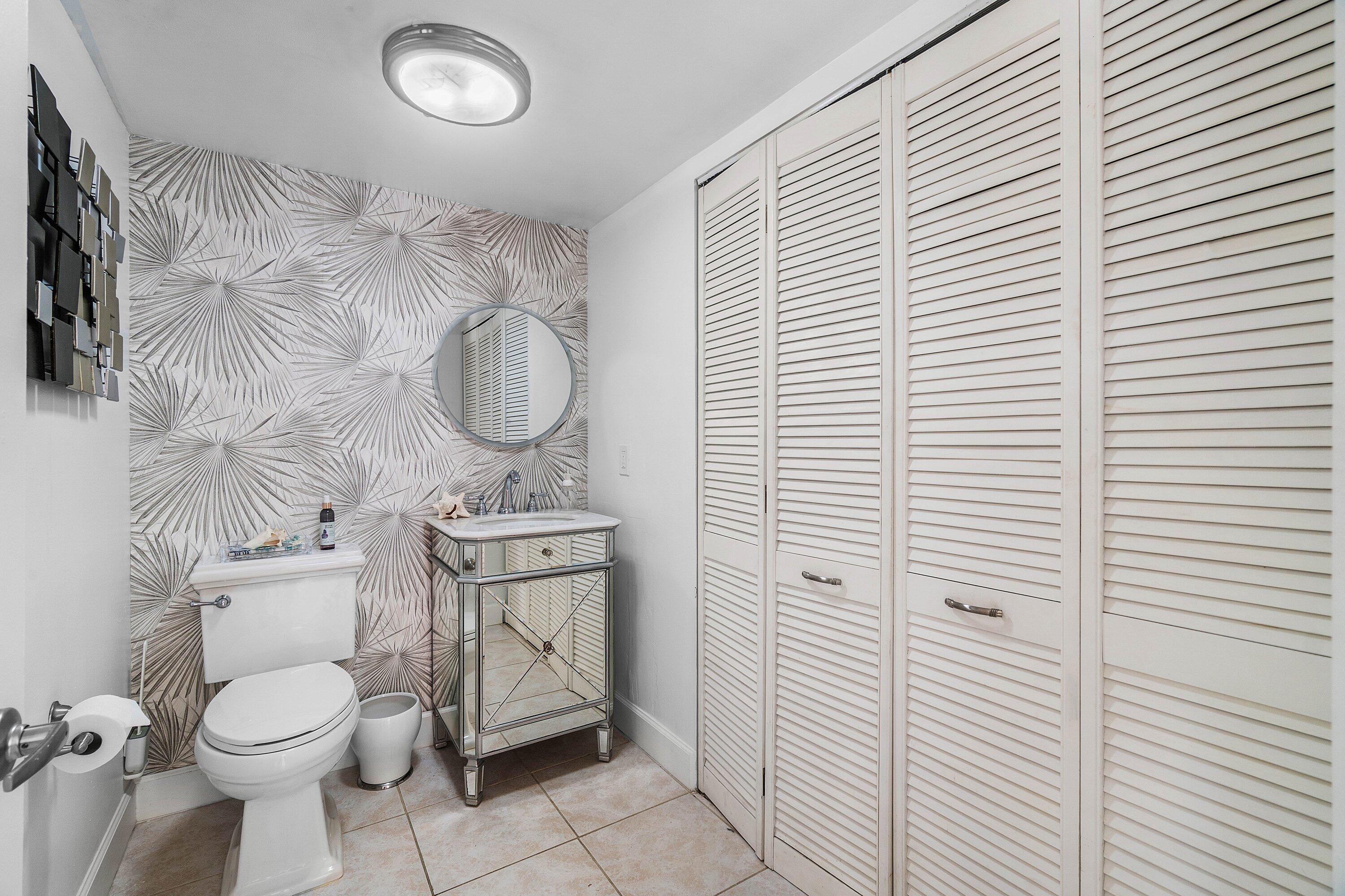 8122 Thames Boulevard, Unit C Boca Raton, FL 33433 - Photo 16 of 43 Half Bath & Laundry