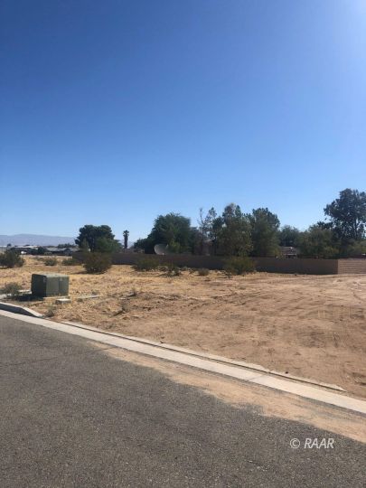 1142 Carolyn Street Ridgecrest, CA 93555 - Photo 4 of 6 a view of a lake and a mountain