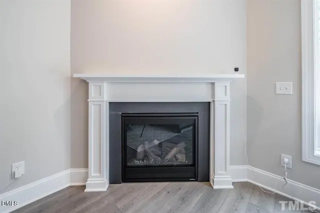 a living room with a fireplace