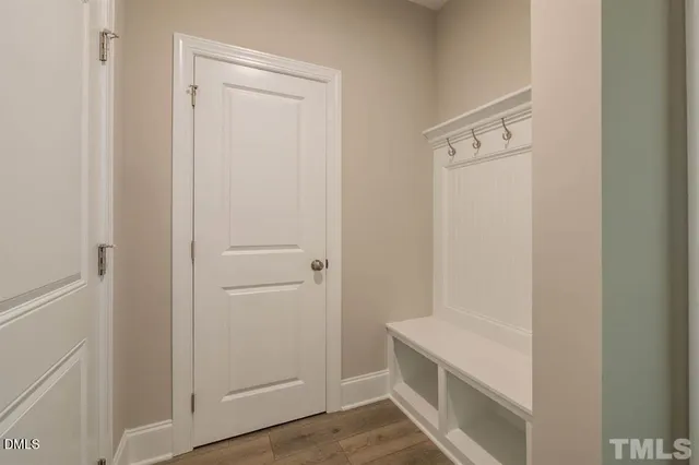 a view of house with swimming pool and porch