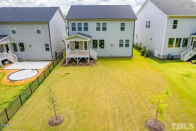 a view of outdoor space with a table and chairs