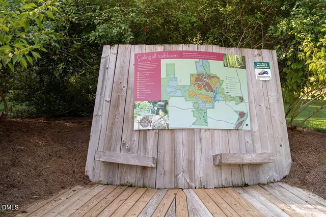 an aerial view of a pool patio swimming pool and outdoor seating