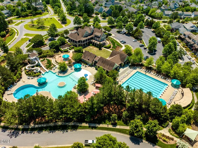 an aerial view of a house with a garden