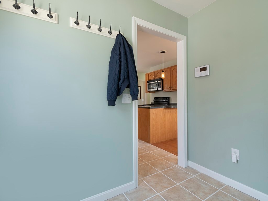 124 Old Mill Road Charlestown, RI 02813 - Photo 6 of 18 Enter Mud room from side of house