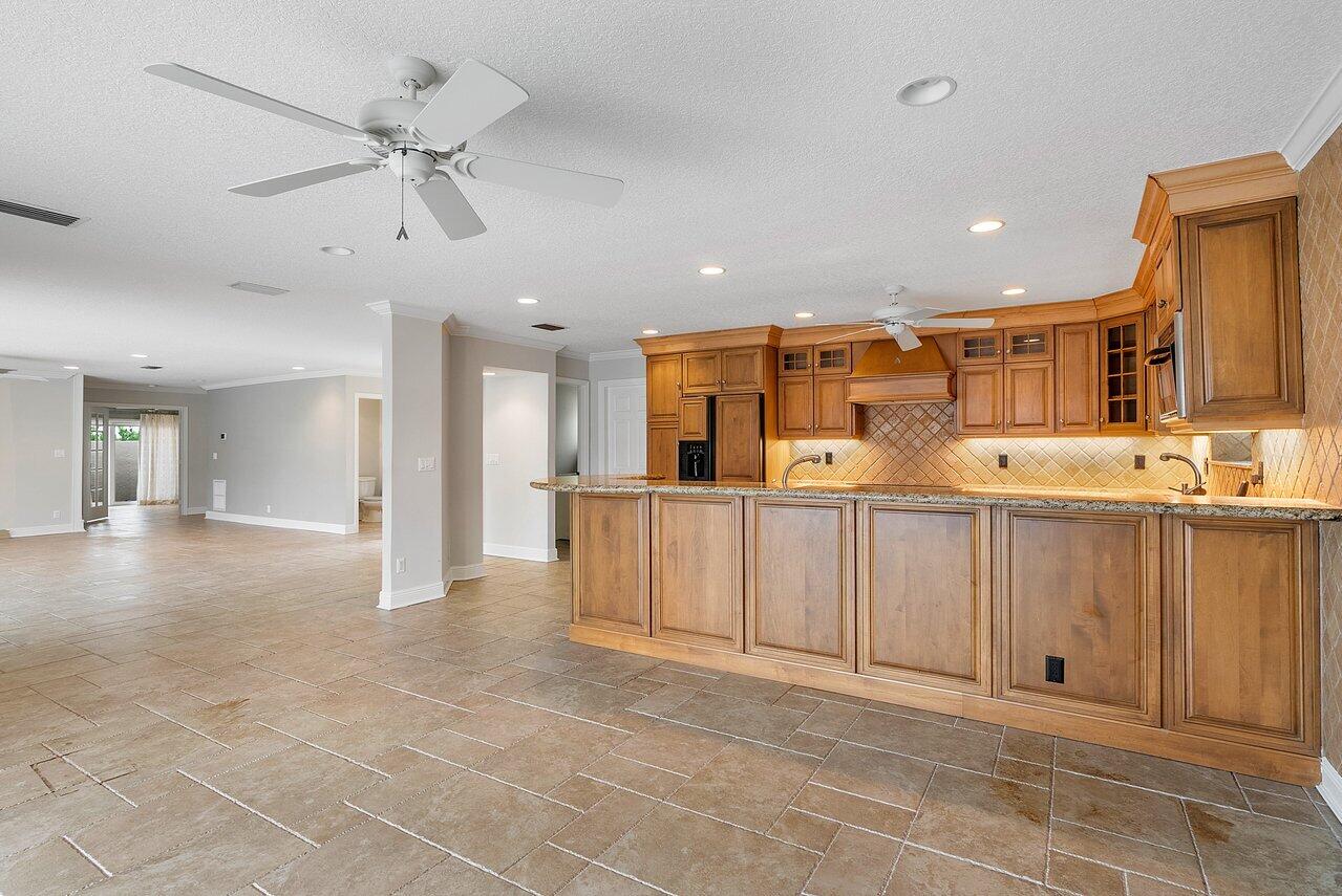 756 Dover Street Boca Raton, FL 33487 - Photo 13 of 29 a view of a kitchen with a sink and a window