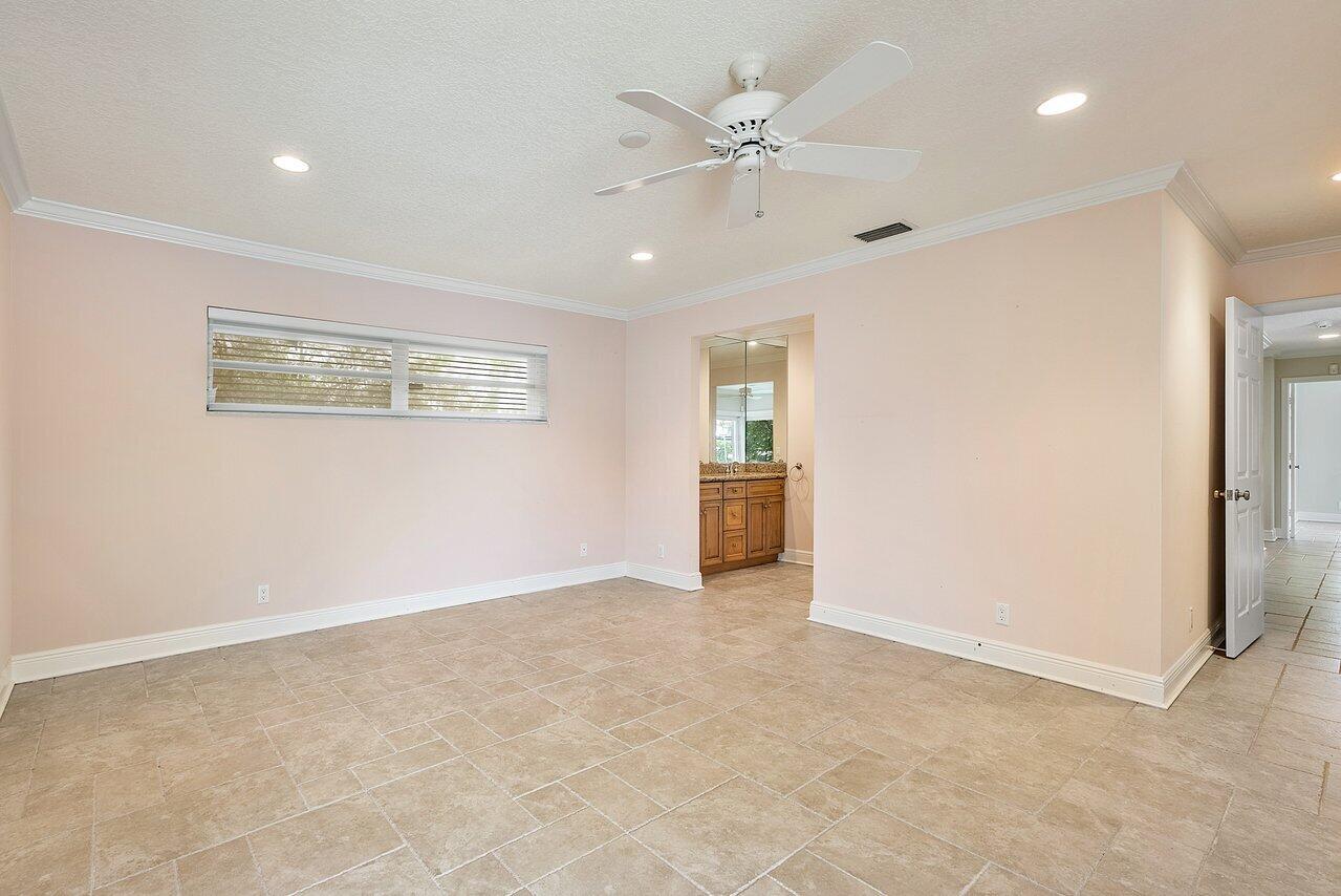 756 Dover Street Boca Raton, FL 33487 - Photo 18 of 29 a view of an empty room with a window