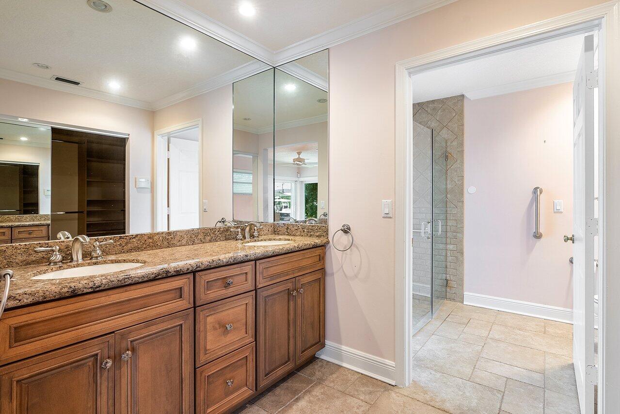 756 Dover Street Boca Raton, FL 33487 - Photo 19 of 29 a bathroom with a granite countertop sink and a mirror
